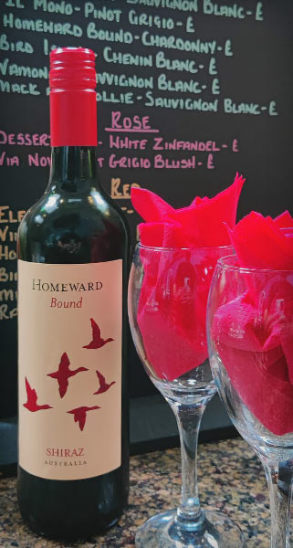 Bottle of Homward Bound Shiraz and two wine glasses